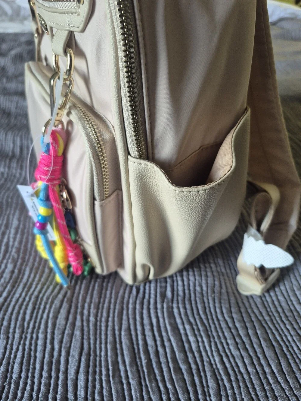 Madden NYC Kids Beige Mini Backpack with Colorful Tassel Charm